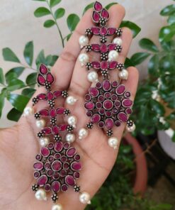 Long Silver Plated Dangler Earrings With Elegant Stone And Pearl Work Design