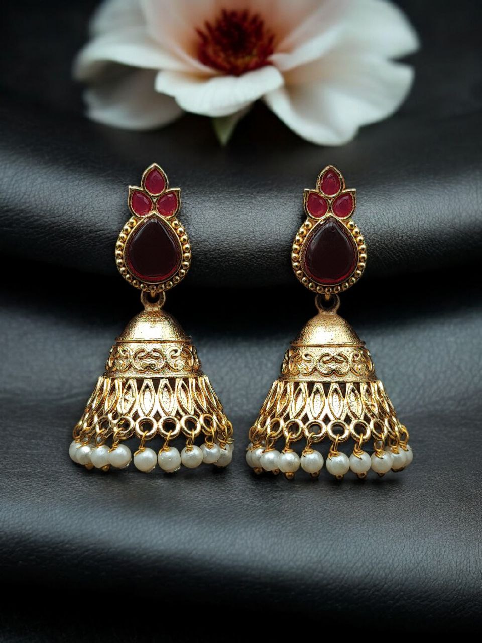 Luxurious Gold Plated Jhumka Earrings with Sparkling Stone Pearl Work