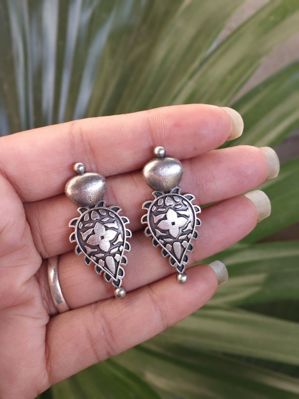 Silver Floral Art Studs Earrings for Women Designer Appeal - Image 2